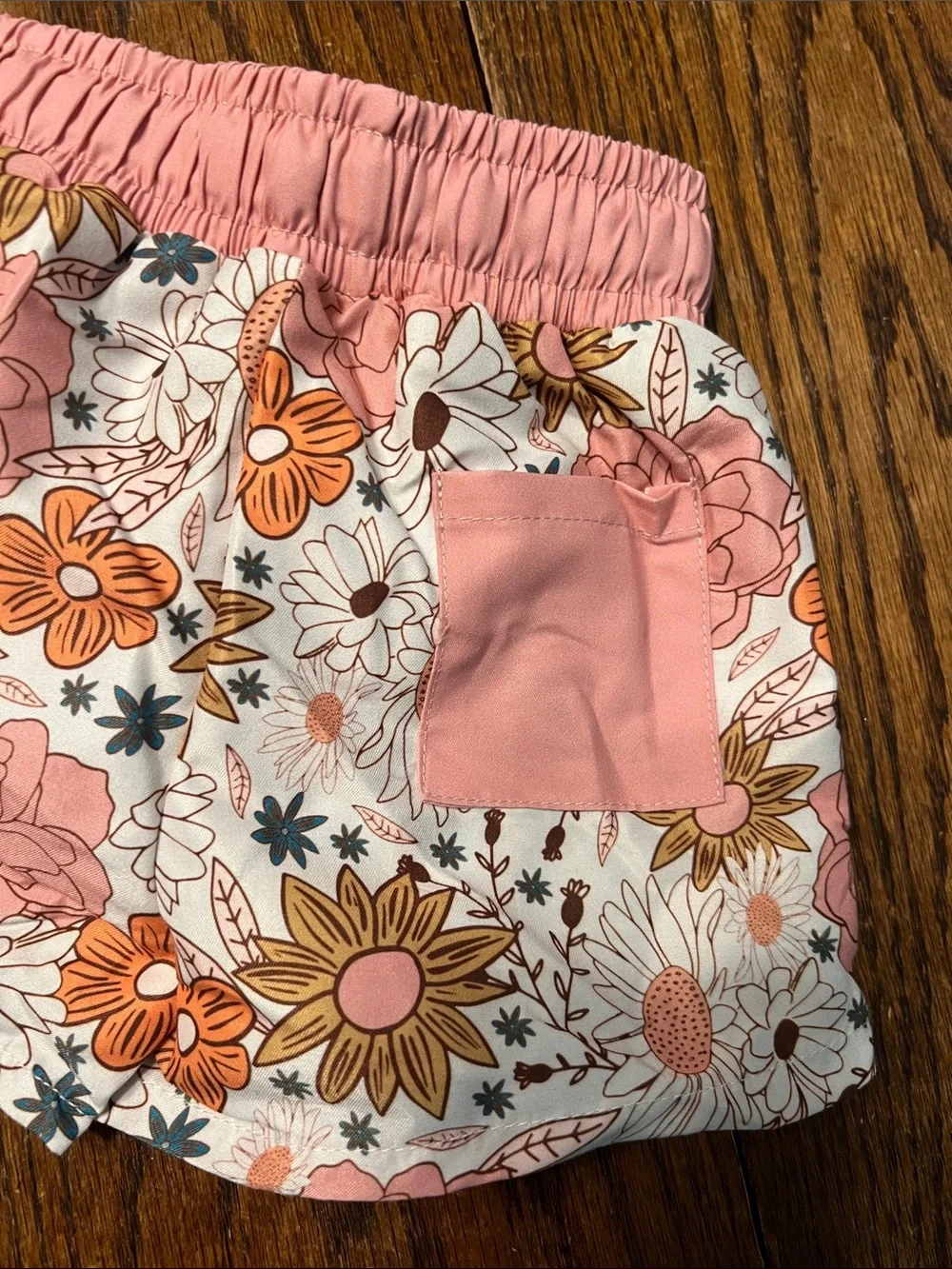 Caden Lane White Floral Swim Trunks with Orange and Pink Accents
